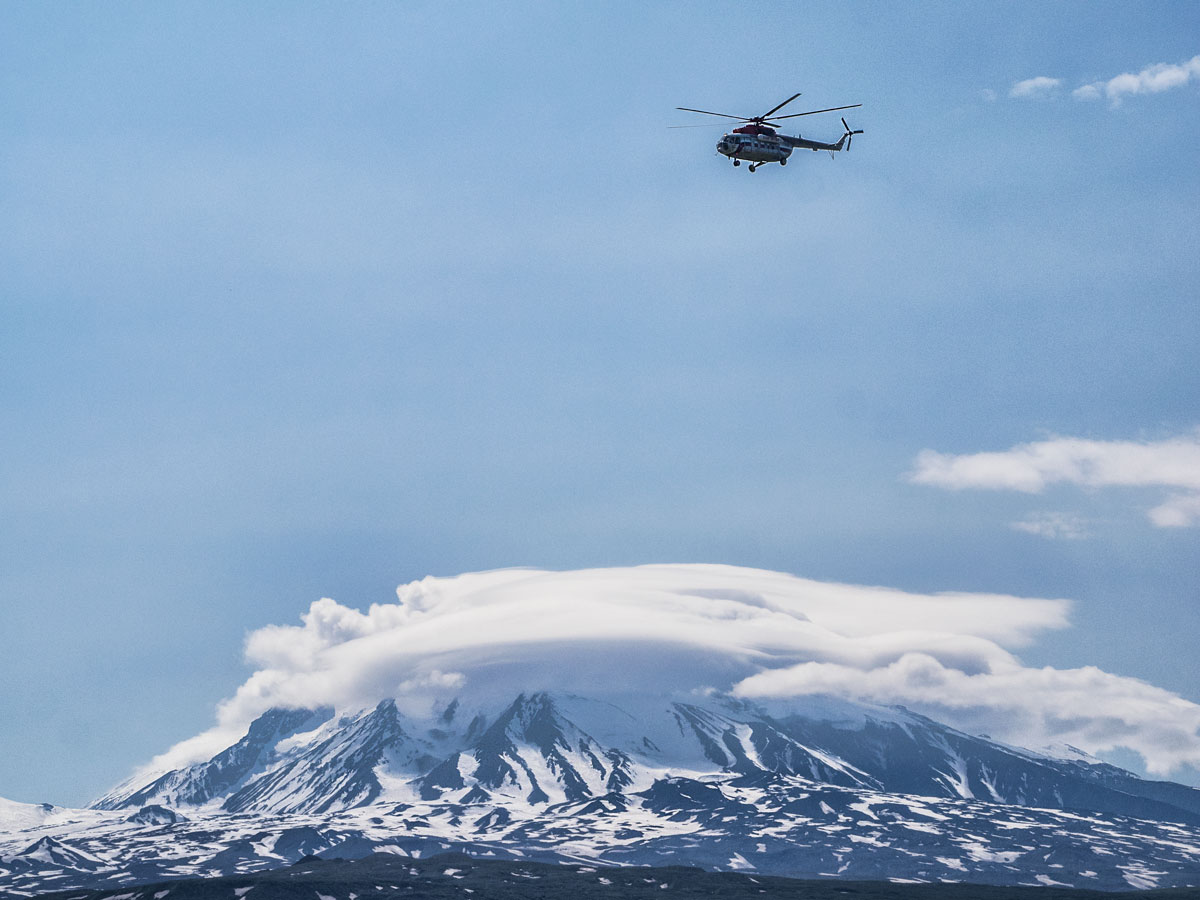 Helicopter over the volcano. Kamchatka
